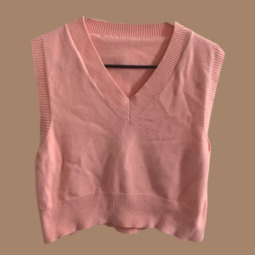pink sweater vest